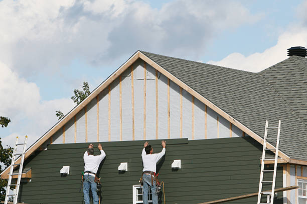Professional Siding Repair technician working in Gnadenhutten, OH